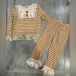 Boutique matching long sleeve and pants set size 7.